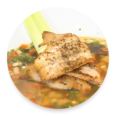 GRILLED PACIFIC ROCKFISH IN A BEAN AND ROASTED ELOTE TOMATO BROTH