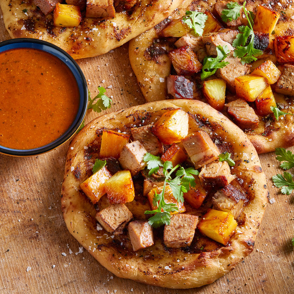 Latin-roasted Pork Flatbreads with Rum-Soaked Pineapple and Black Garlic Butter